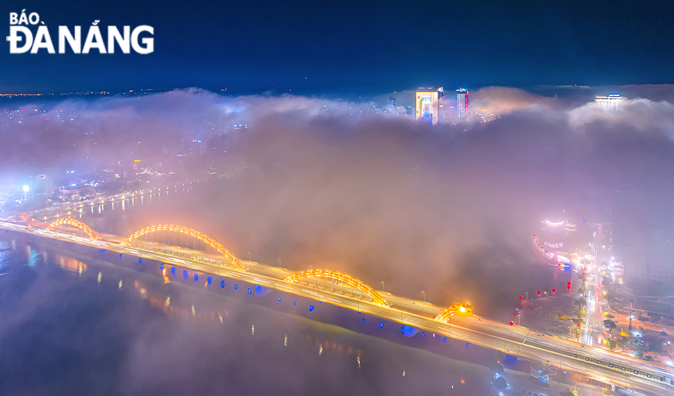 The Rong (Dragon) Bridge is hidden in the mist