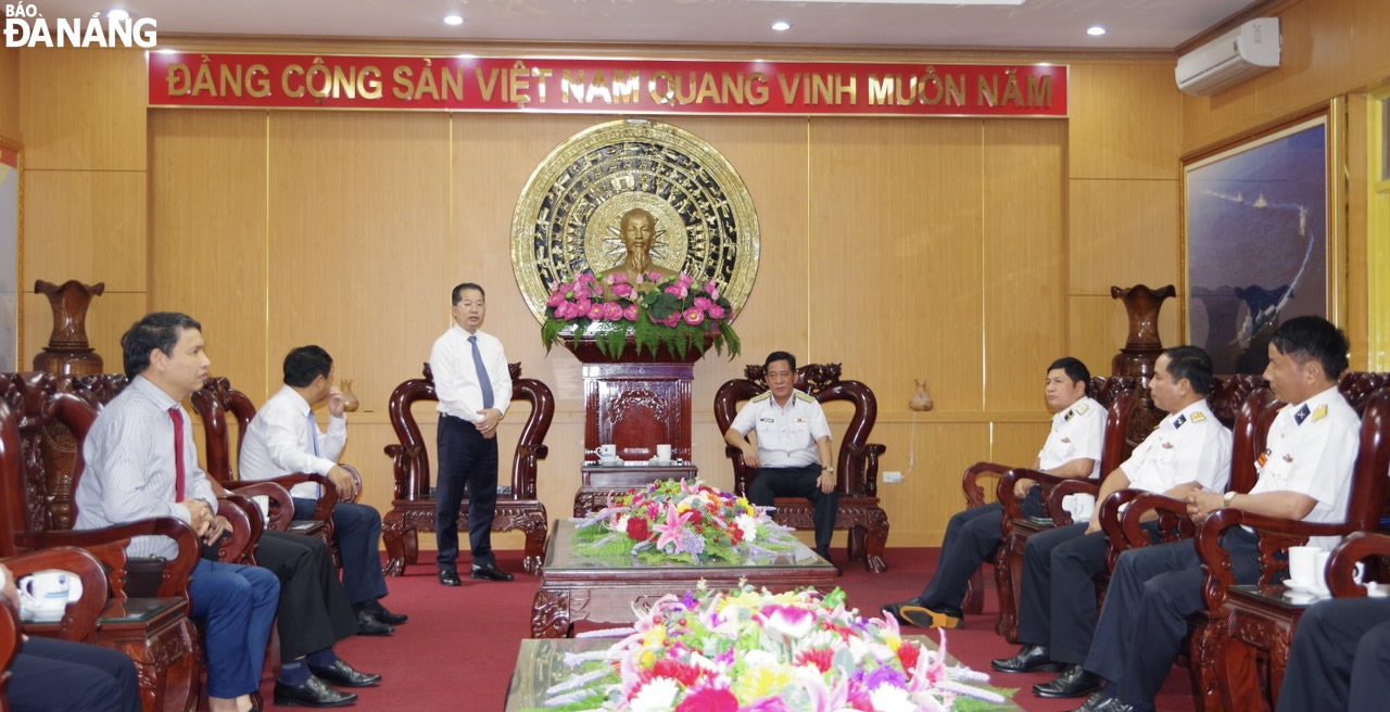 Secretary Quang (standing) speaking during his meeting with the Navy Region 4 High Command