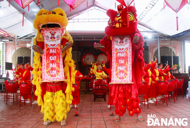 A drum and lion dance performance at the Hoa Phu Village Communal House Festival on Friday.