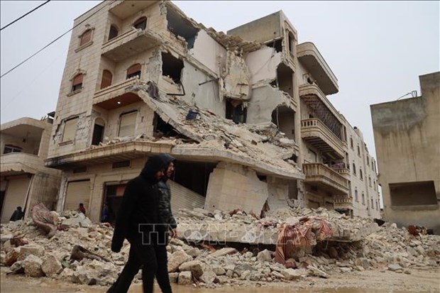 A building is destroyed after the earthquake hits Idlib province, Syria, on February 6. (Photo: AFP/VNA)