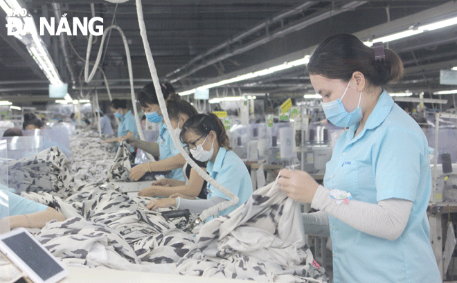 The enthusiastic working atmosphere is observed at the PI Vina Danang Co., Ltd. Photo: X.HAU