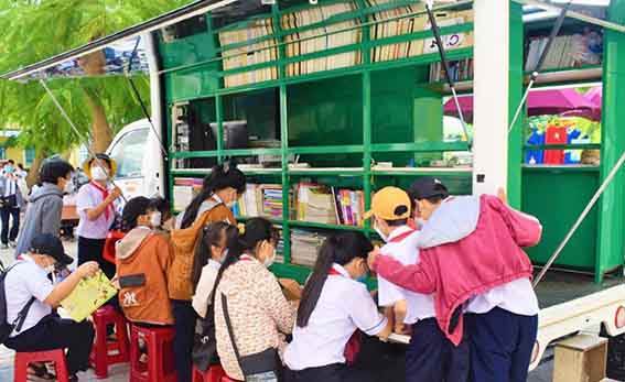 Mobile library in rural area, promoting reading among children