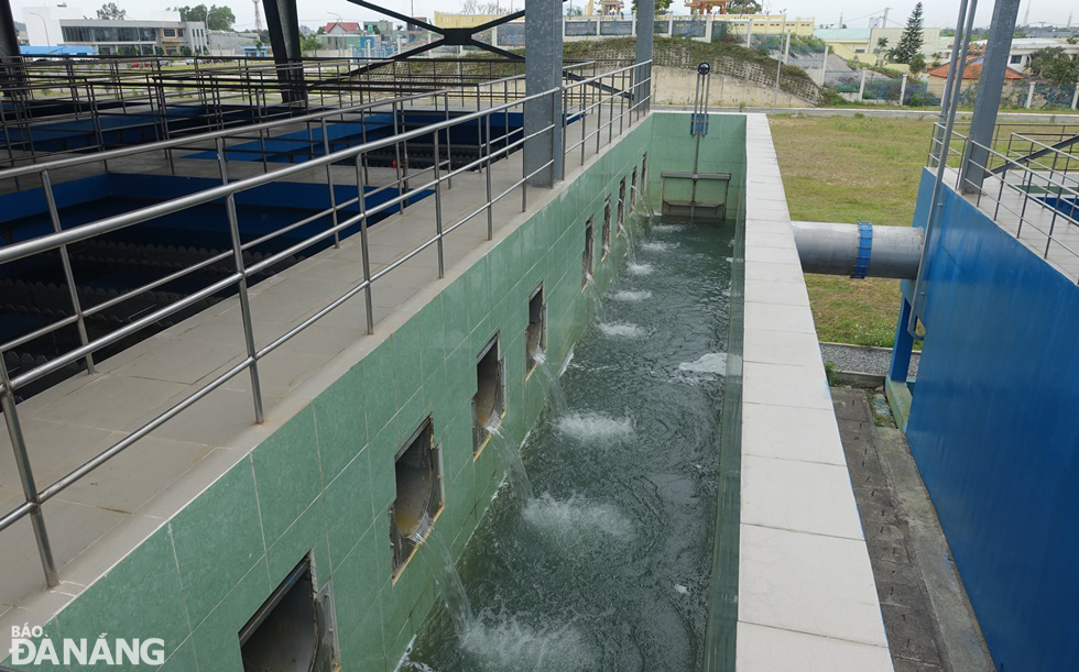 After flowing through many clusters of settling and filtering tanks, water continues to flow through the next clusters of treatment tanks.
