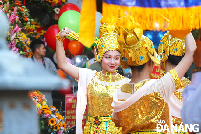 The Buddhist girls of the Quan The Am Pagoda  perform a dance to welcome the appearance of the image of Bodhisattva Avalokitesvara