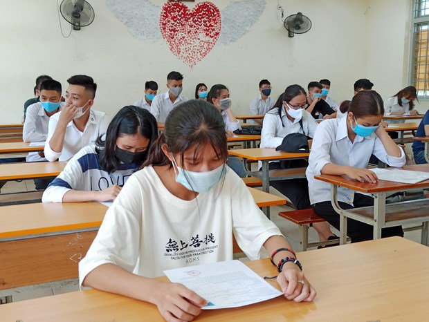 Thí sinh dự thi tốt nghiệp trung học phổ thông. (Ảnh: Phạm Mai/Vietnam+)