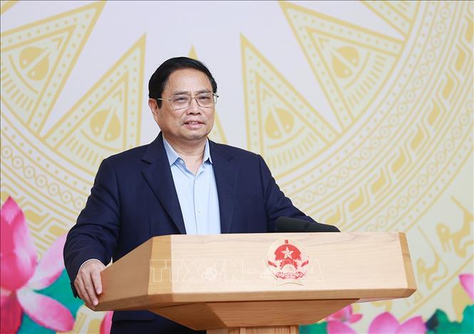 Thủ tướng Phạm Minh Chính phát biểu khai mạc Phiên họp lần thứ 5 Ủy ban Quốc gia về chuyển đổi số. Ảnh: Dương Giang/TTXVN