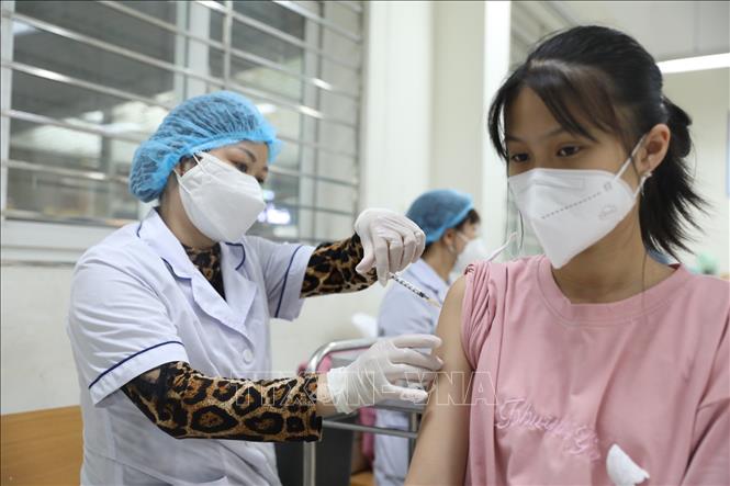 Tiêm vaccine phòng Covid-19 cho trẻ em. Ảnh: Minh Quyết/TTXVN