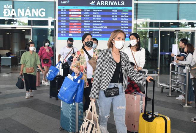 International tourists arrive at Da Nang International Airport. Photo: THU HA