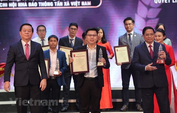 Phóng viên Báo Điện tử VietnamPlus được trao giải A tại Giải Báo chí Quốc gia lần thứ 16 năm 2021. (Ảnh: Hoài Nam/Vietnam+)