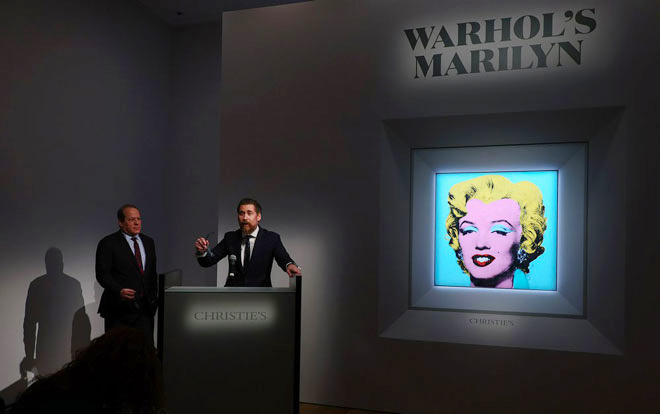 Bức chân dung Marilyn Monroe của Andy Warhol này đã bán được 195 triệu USD, và là một trong những giao dịch nghệ thuật có giá trị cao của năm 2022.  Ảnh: Dia Dipasupil/Getty Images