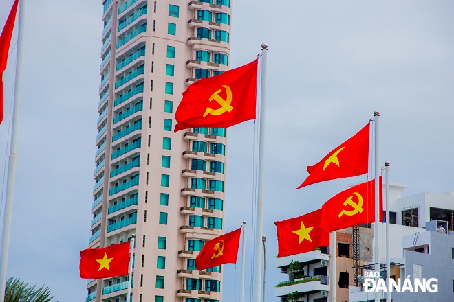 Vietnamese national flags are seen every corner of the city