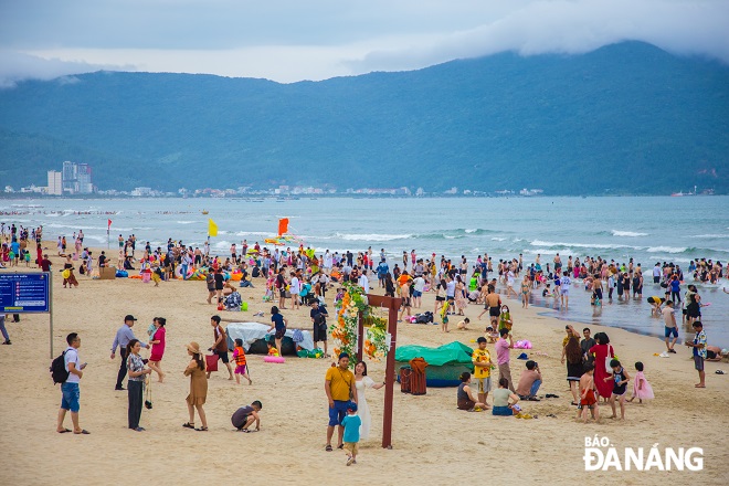 Crowds of people are observed at local beaches