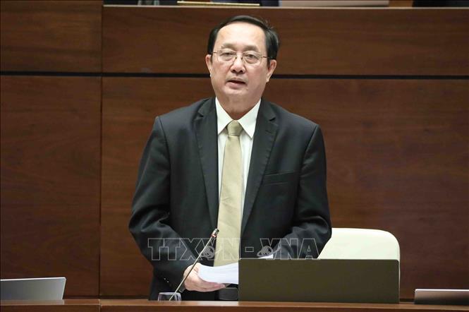 Bộ trưởng Bộ Khoa học và Công nghệ Huỳnh Thành Đạt trả lời chất vấn. Ảnh: TTXVN
