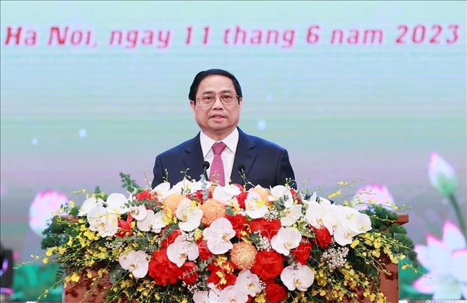 Thủ tướng Phạm Minh Chính phát biểu tại Hội nghị biểu dương, tôn vinh điển hình tiên tiến toàn quốc. Ảnh: Dương Giang/TTXVN