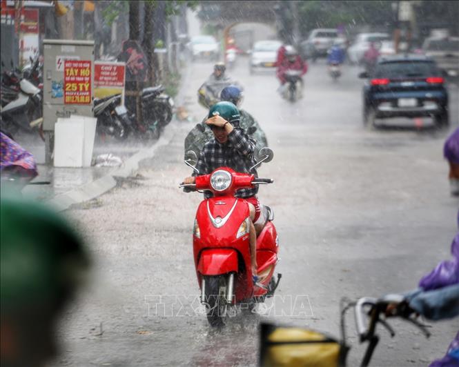 Theo dự báo, ngày và đêm 19-6, khu vực Bắc Bộ có mưa rào và dông. Ảnh minh họa: Tuấn Đức/TTXVN