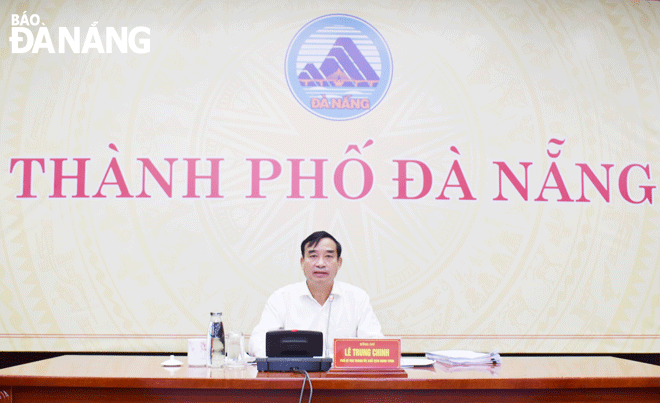 Chủ tịch UBND thành phố Lê Trung Chinh chủ trì phiên họp vào ngày 23-6. Ảnh: T.HÙNG