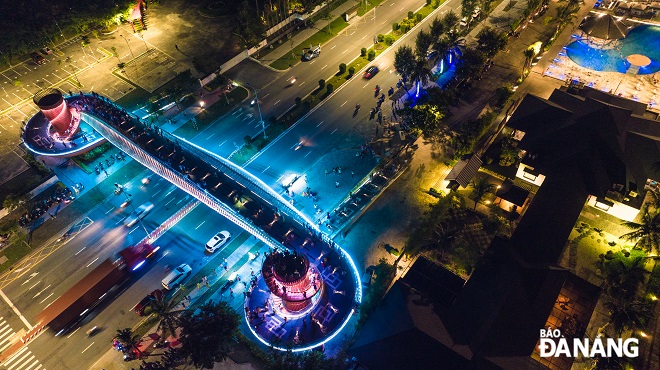 The inauguration of the Japan-style pedestrian overpass aimed to celebrate the 50th anniversary of the establishment of the Viet Nam - Japan diplomatic ties