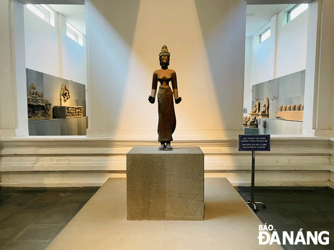 The bronze version of the Tara/Laksmindra Lokesvara bodhisattva statue, dating from the late 9th and 10th centuries, was recognized as a national treasure in 2012 and displayed in a solemn position at the Museum of Cham Sculpture. Photo: TUONG VY