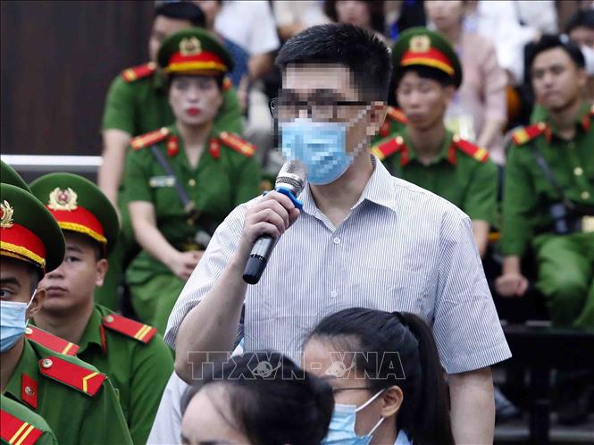 Bị cáo Nguyễn Quang Linh, cựu trợ lý Phó Thủ tướng khai báo trước toà. Ảnh tư liệu: Phạm Kiên/TTXVN