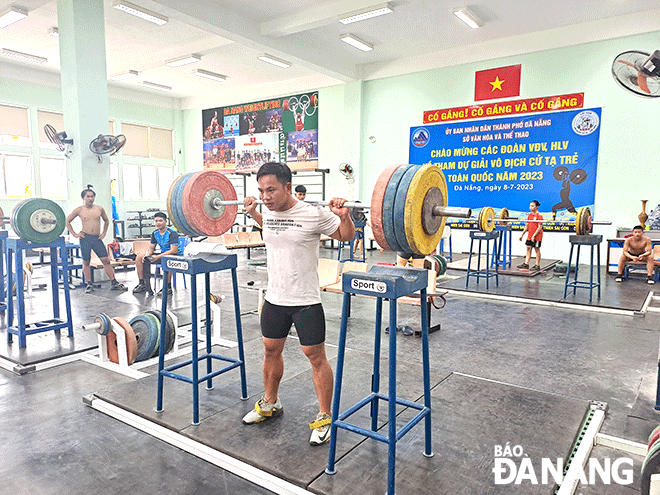 Weightlifters practice hard at the city's Athlete Training and Coaching Center. Photo: KHANH HOA