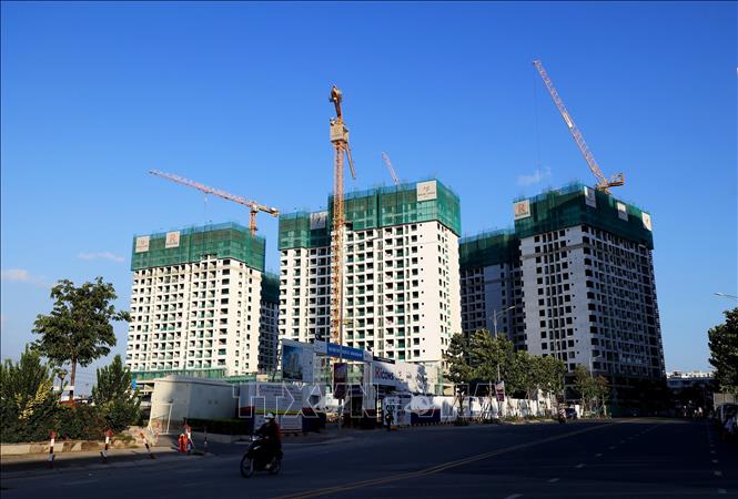 Dự án chung cư đang thi công trên đường Võ Văn Kiệt, quận Bình Tân, Thành phố Hồ Chí Minh. Ảnh: Hồng Đạt/TTXVN