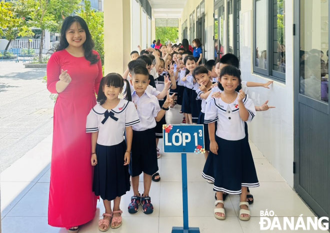 First graders at the Vo Thi Sau Primary School based in Hai Chau District line up to go to classes. Photo: NGOC HA