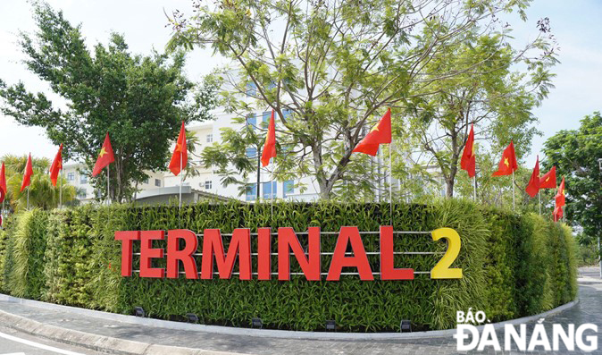   The entrance to the arrival and departure halls of the Da Nang International Airport are splendidly decorated to celebrate the National Day. Photo: THU HA