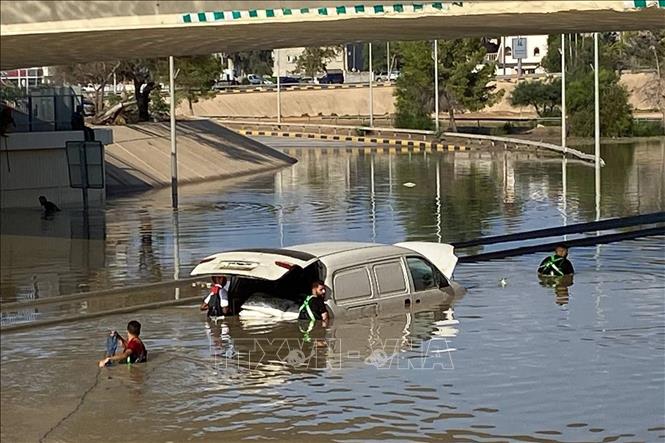 Ngập lụt do bão Daniel tại thành phố Derna, Libya ngày 12/9/2023. AFP/TTXVN