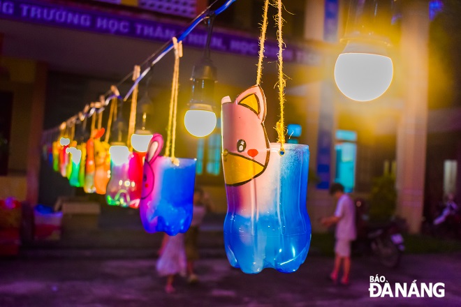 Mid-Autumn Festival lanterns made from recycled items at the party for pupils at the Thuong Hoa Primary and Junior High School in Minh Hoa District, Quang Binh Province