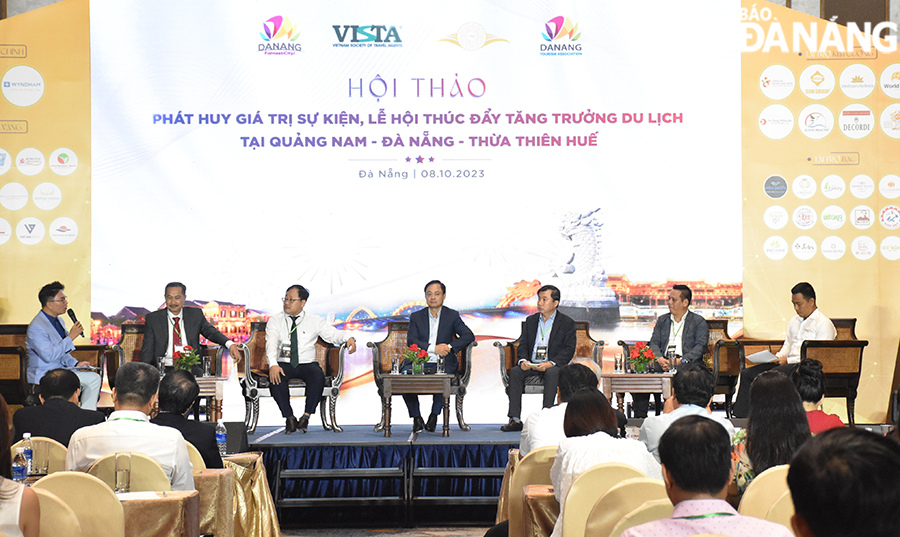 Speakers participate in discussions at the conference. Photo: THU HA