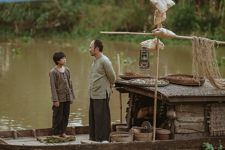 An và ông Tiều - thành viên Thiên Địa Hội, nay đổi thành Chính Nghĩa Hội do gây tranh cãi. (Ảnh chụp từ phim)