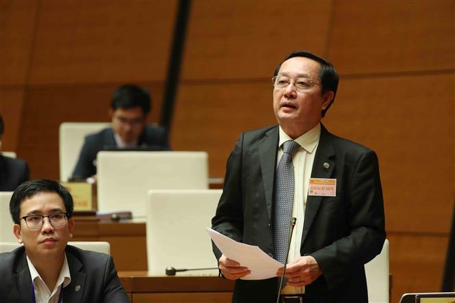 Bộ trưởng Bộ Khoa học và Công nghệ Huỳnh Thành Đạt trả lời chất vấn. Ảnh: Doãn Tấn/TTXVN