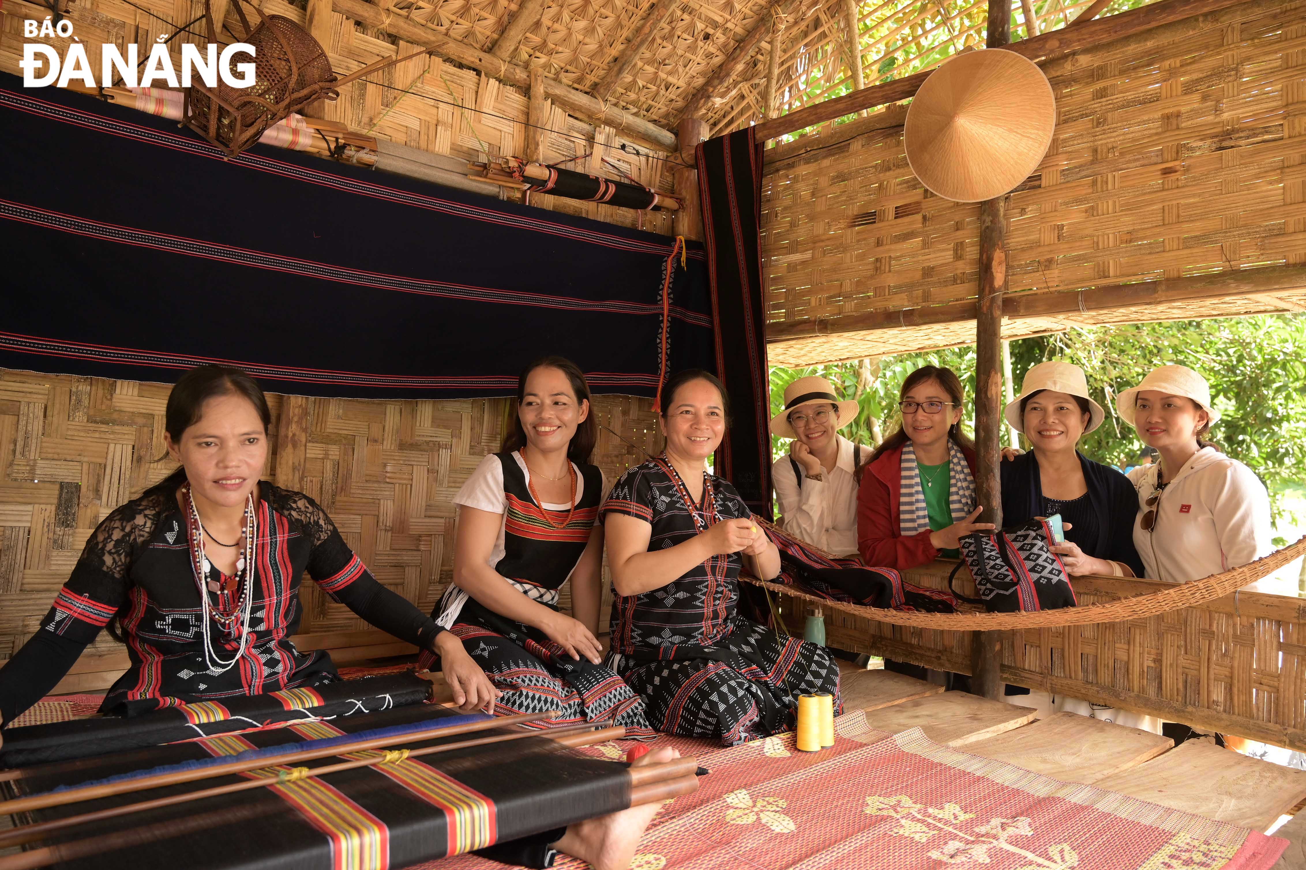 Apart from preserving local cultural heritage, the Hoa Bac Cooperative of Eco-Agriculture and Community-based Tourism has helped Co Tu ethnic minority women earn a steady income. Photo: TRAN TRUC