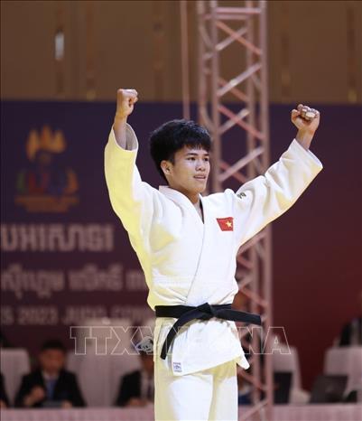 VĐV Chu Đức Đạt giành HCV hạng cân 60kg nam tại SEA Games 32. Ảnh: Minh Quyết/TTXVN