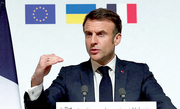 Tổng thống Pháp Emmanuel Macron phát biểu tại buổi họp báo sau hội nghị thượng đỉnh về vấn đề Ukraine vào ngày 26-2. Ảnh: Reuters  	