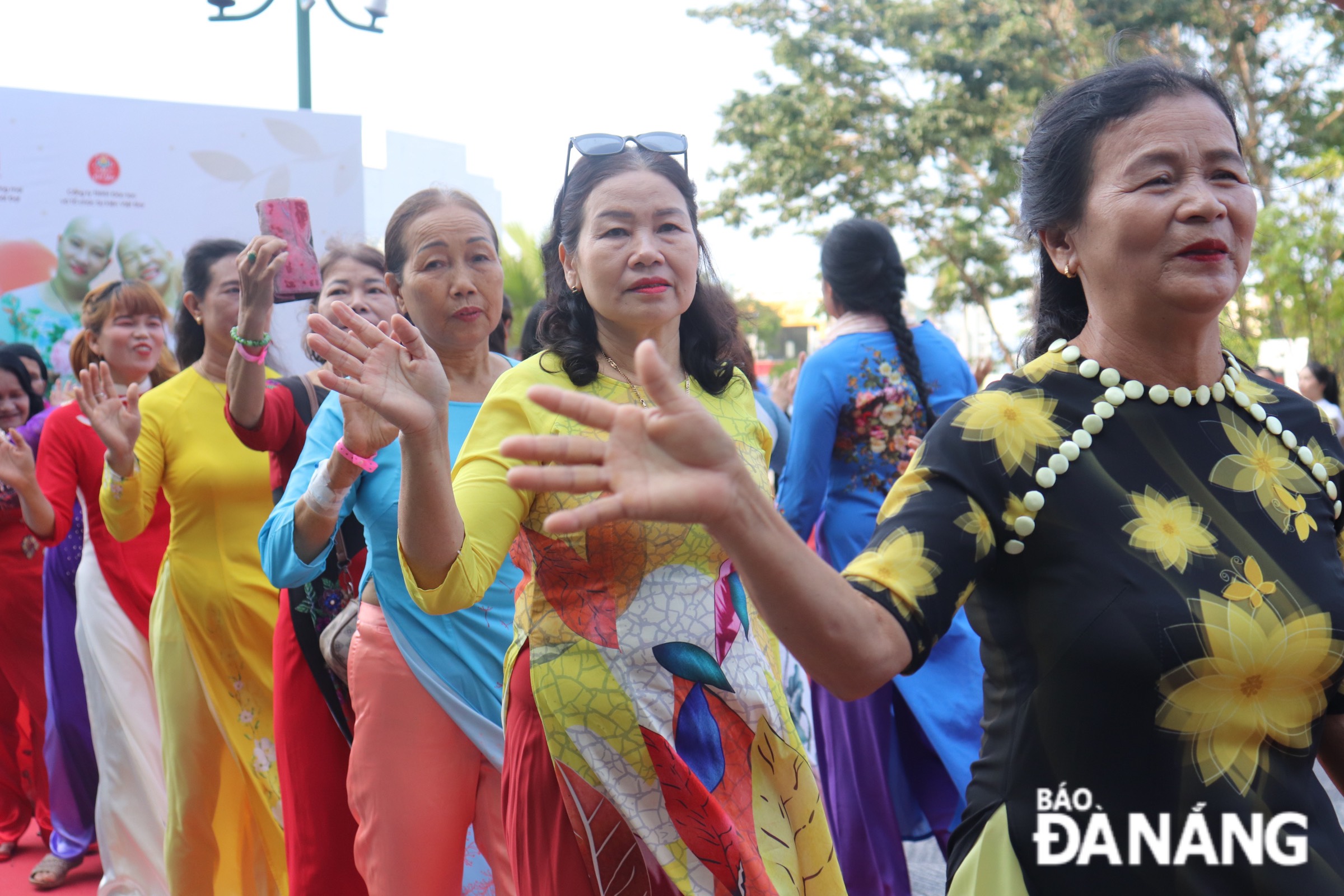 Female patients in 'Ao Dai' excitedly performed a fashion show. PHOTO: KHANH NGAN