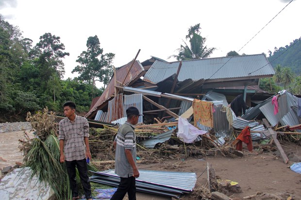 A house is damaged after heavy rains in Pesisir Selatan, West Sumatra, Indonesia on March 10. (Photo: AFP/VNA)