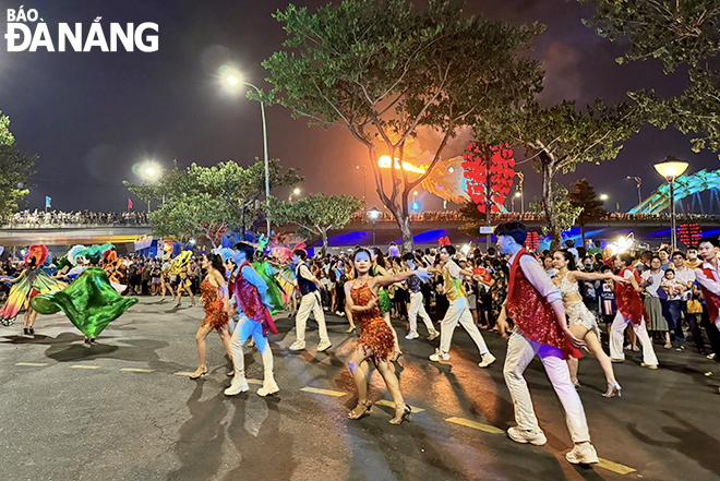 The troupe of dancers paraded, performing vibrant dances to the music of Vietnamese and international songs