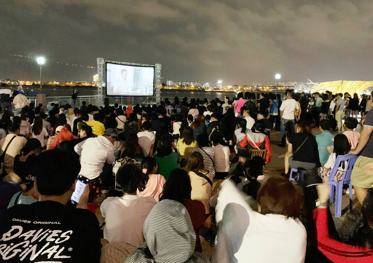 Da Nang residents and tourists watch a movie 