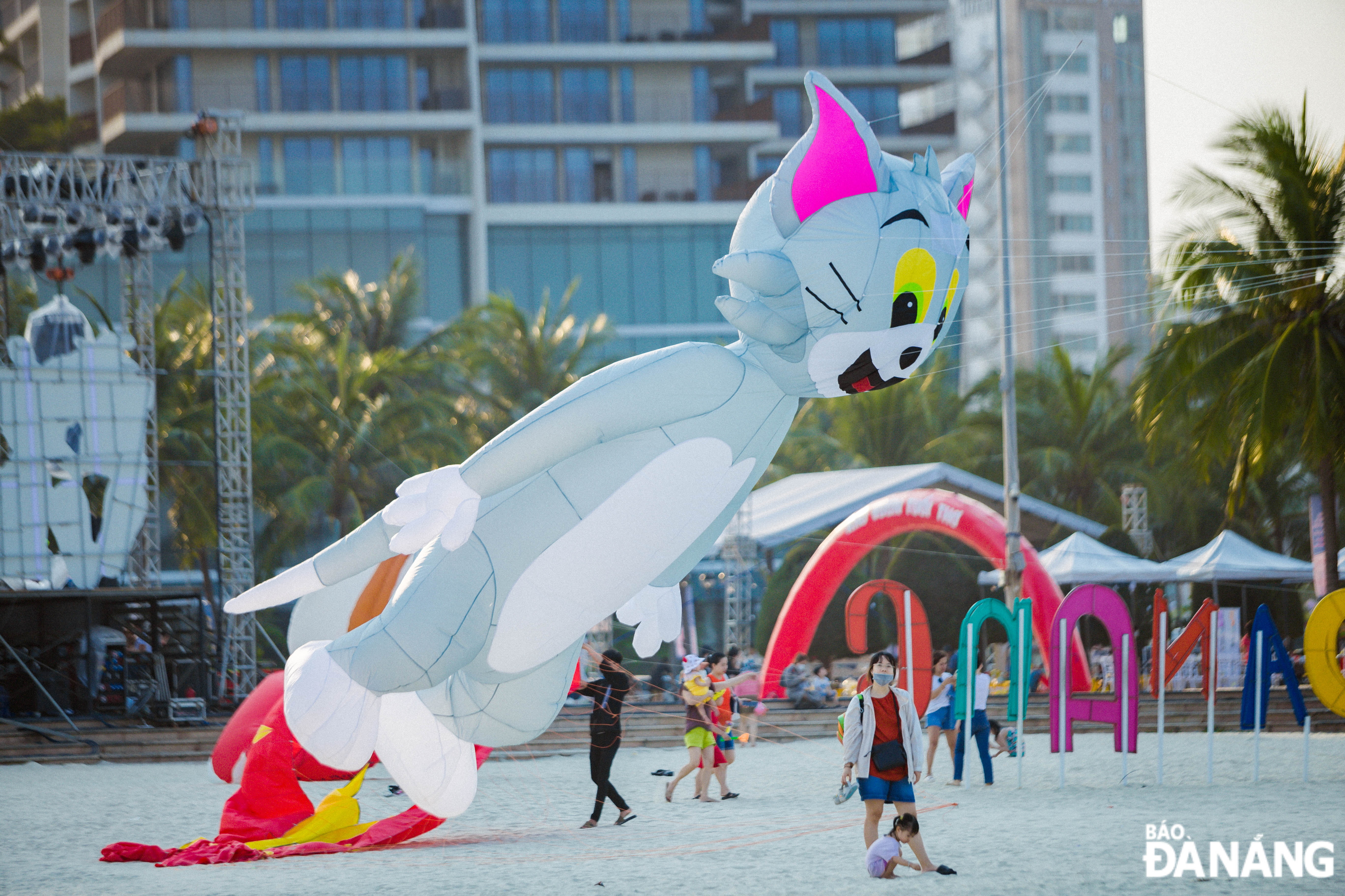 Many kites have unique shapes. In the photo: Kite shaped in a giant Tom cat, a main character in the Tom & Jerry cartoon.