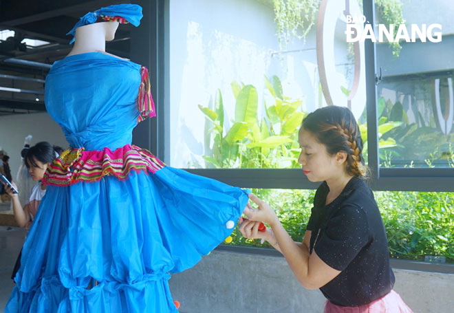 A dress made from recycled nylon bags on display at the exhibition. Photo: L.V