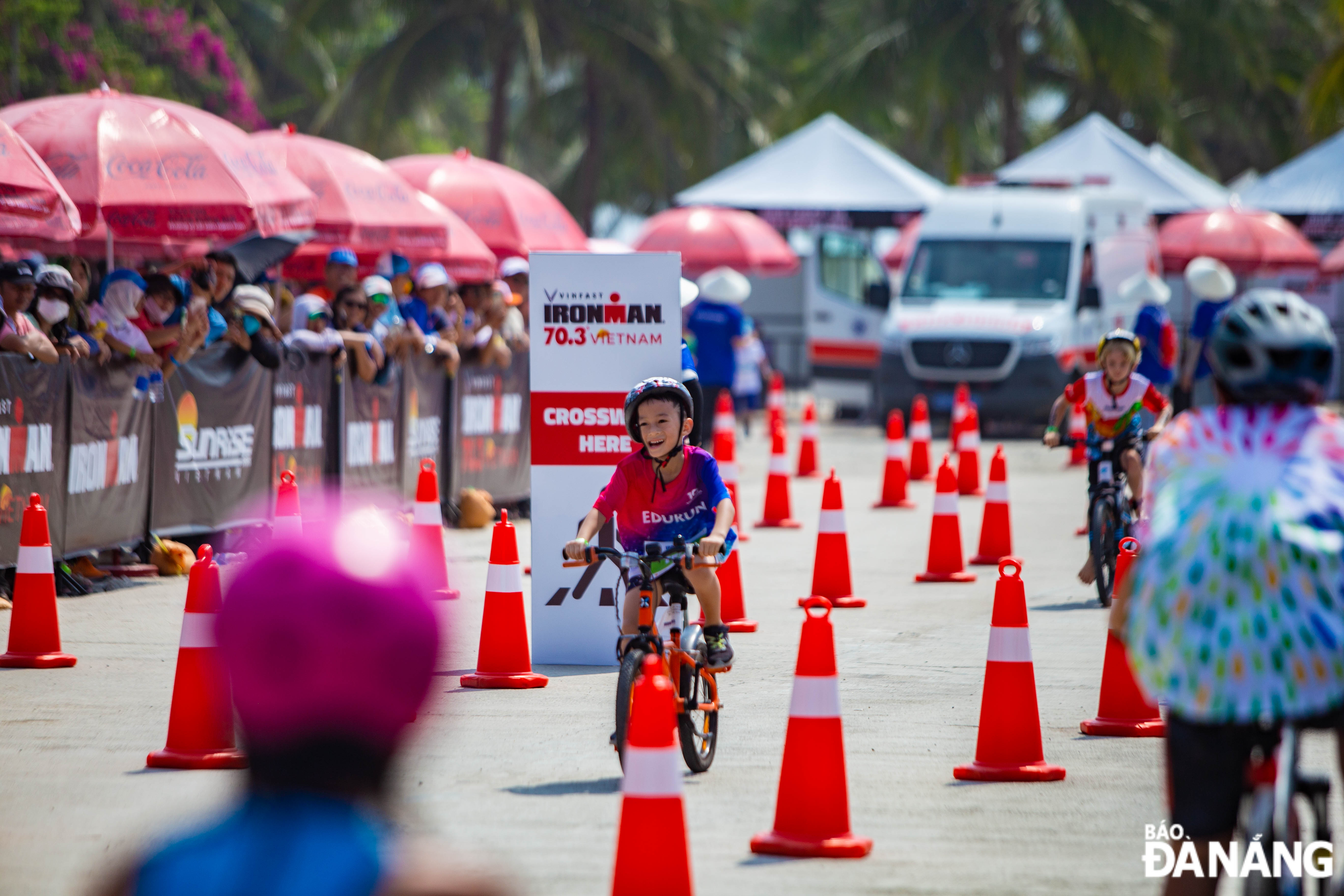 Young athletes compete in extremely hot weather.