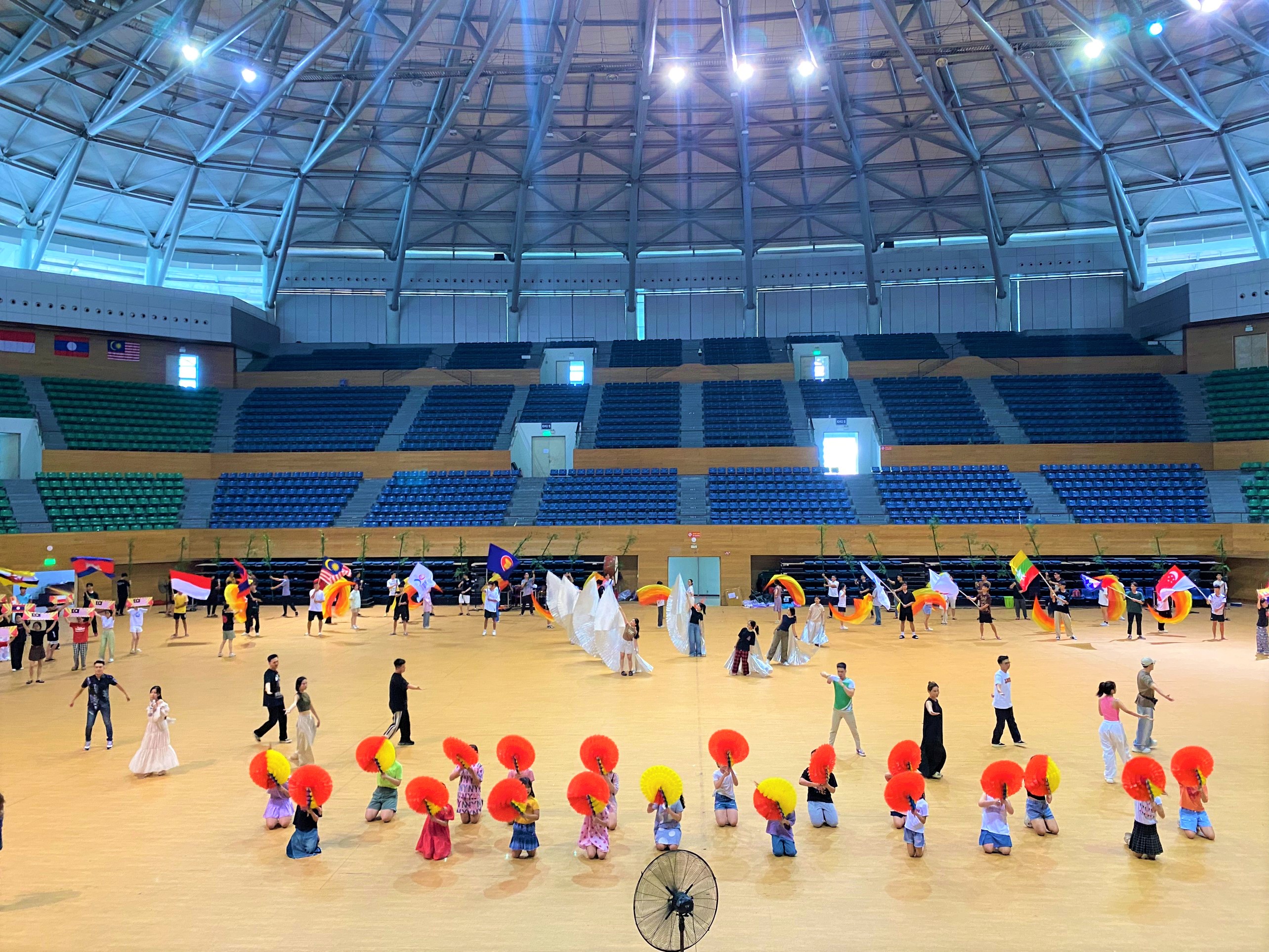 Badminton competition, and the opening and closing ceremonies of the 13th ASEAN Schools Games will take place at the Tien Son Sports Arean. IN PHOTO: Artistes, volunteers and students practice for the arts programme at the opening ceremony. Photo: P.N