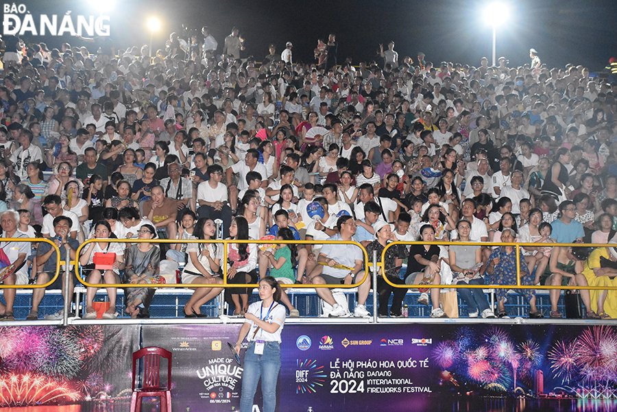  The viewing stands are filled with spectators.