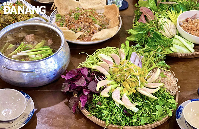 Attractive ‘linh’ fish sauce hotpot serve at the Young rice - Countryside cuisine eatery located on Duc Loi 2 street, Thuan Phuoc Ward, Hai Chau District, Da Nang. Photo: H.L