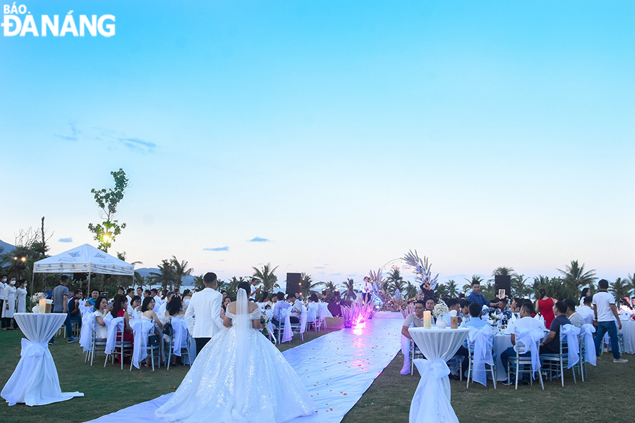 Here is a scene of a wedding party held at the Furama Da Nang resort. Photo: THU HA