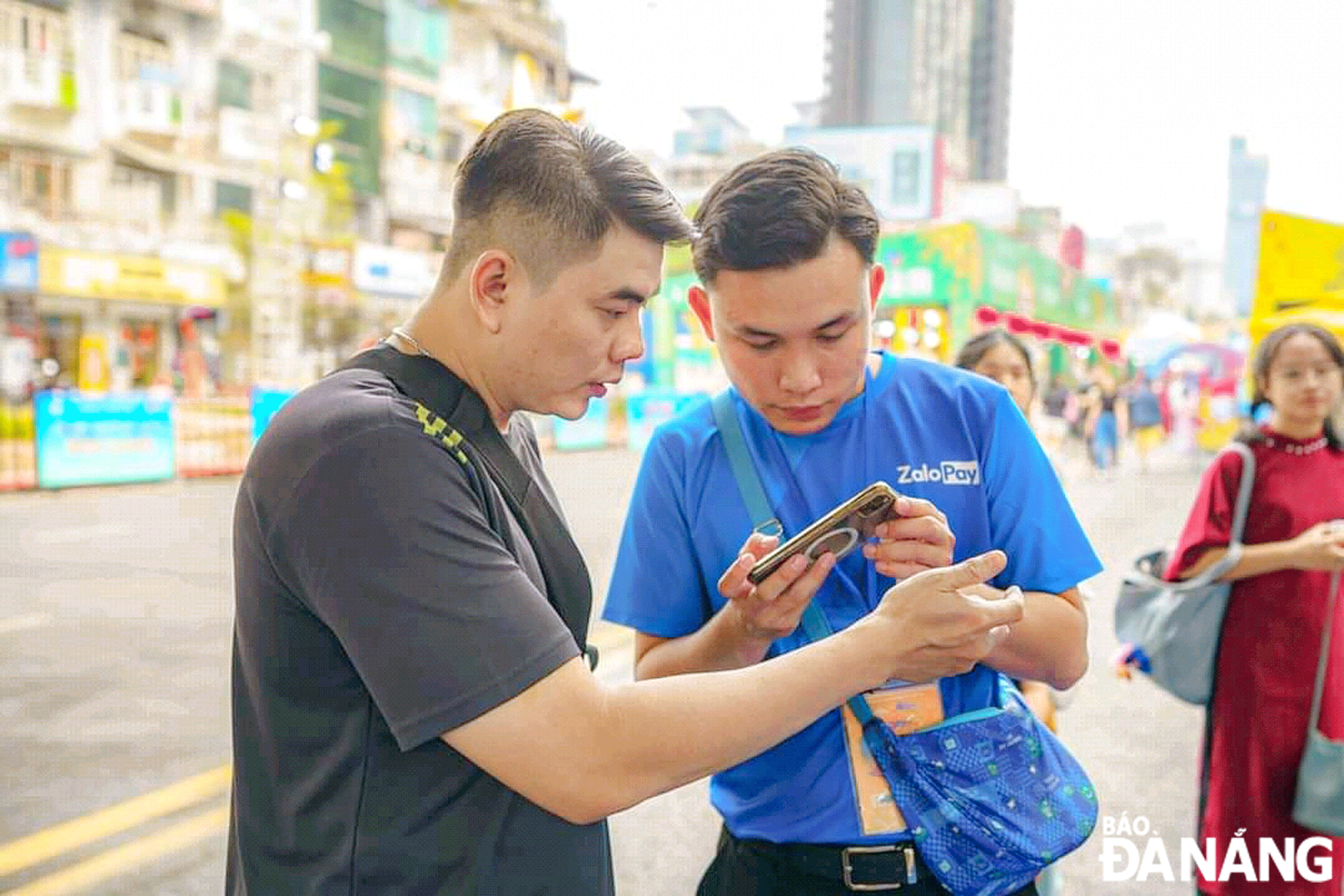 Many technology businesses are concentrating on developing online payment platforms and QR code scanning. Photo: CHIEN THANG