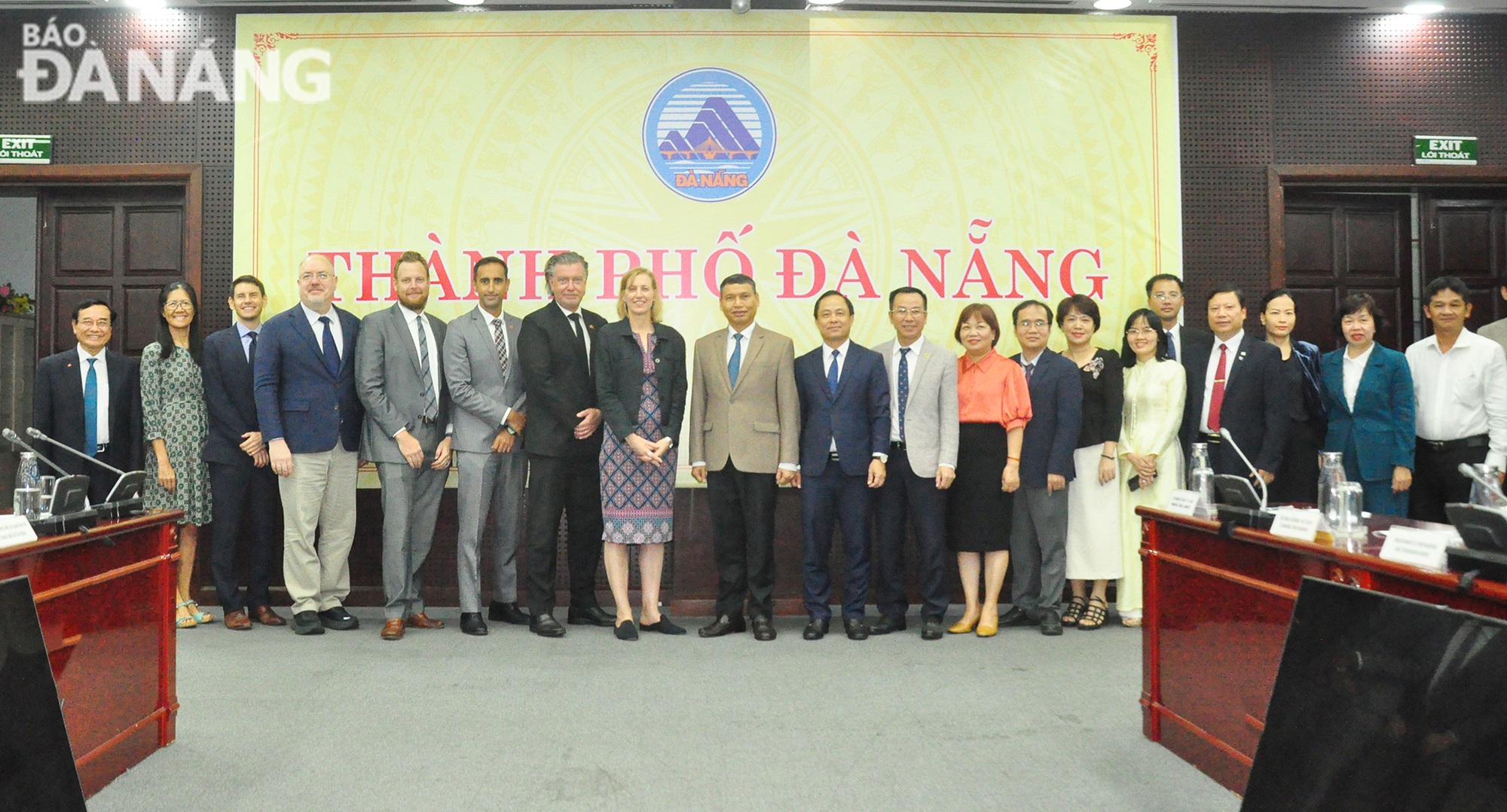 Members of the working group posing for a souvenir photo. Photo: THANH LAN