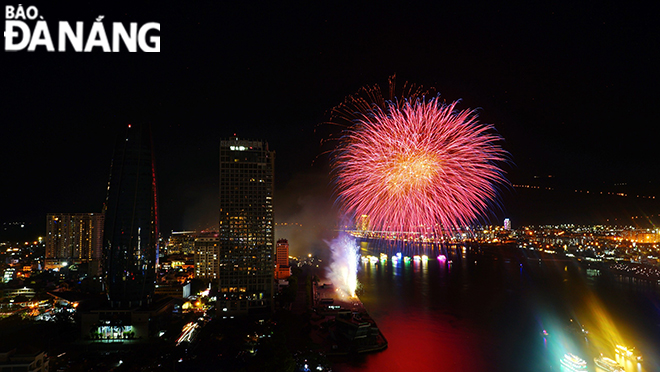 A fireworks show is seen from high-rise buildings. Photo: XUAN SON