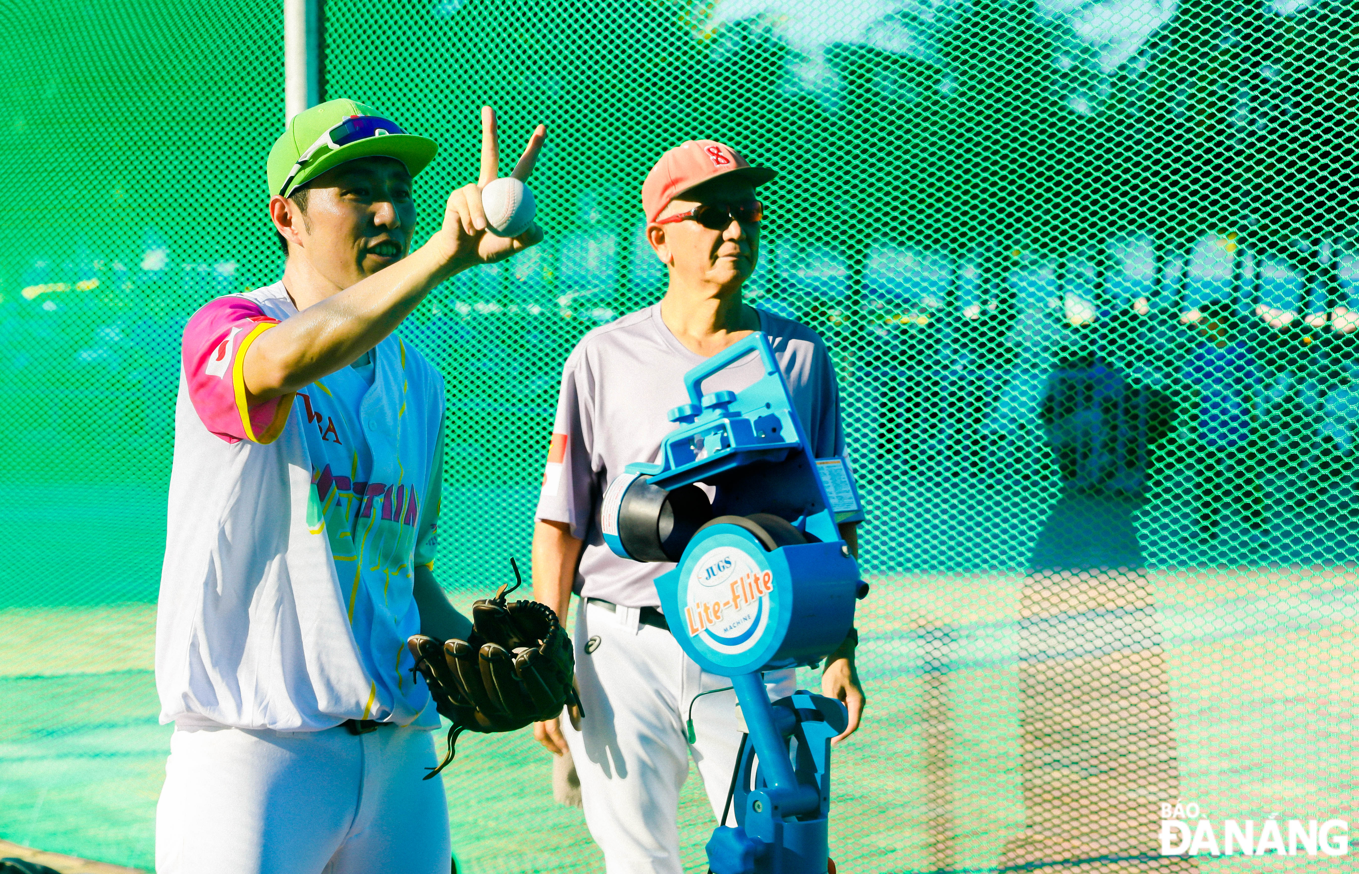 Many Japanese professional athletes instruct people and tourists on how to play baseball